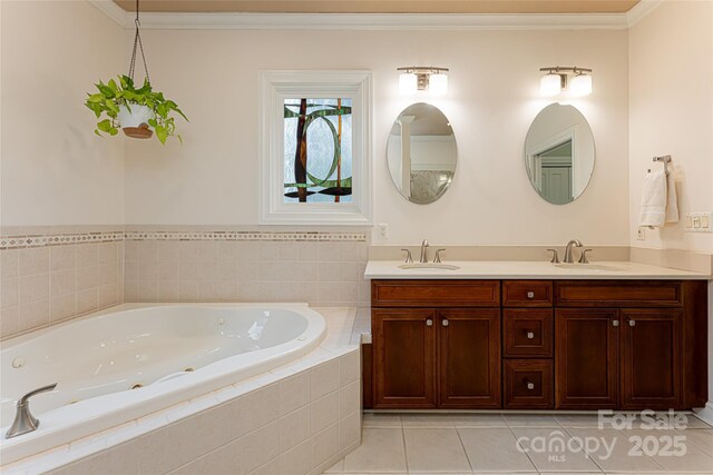 full bathroom with a whirlpool tub, double vanity, ornamental molding, and a sink