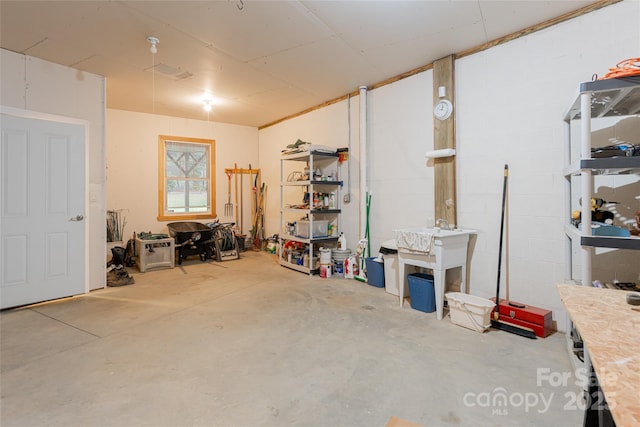 basement featuring concrete block wall