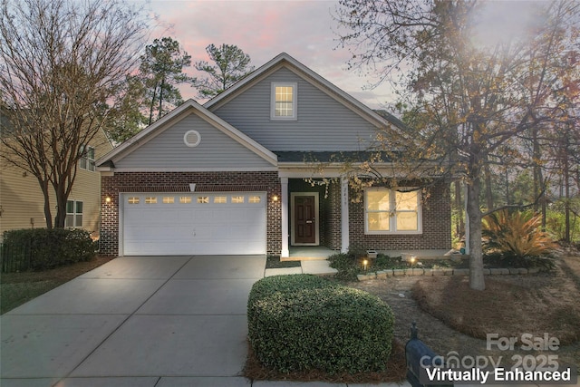 2439 Bergamot St, Fort Mill, SC 29708 - view of front of property with brick siding, driveway, and an attached garage
