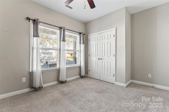 2439 Bergamot St, Fort Mill, SC 29708 - unfurnished bedroom with a closet, baseboards, visible vents, and carpet floors