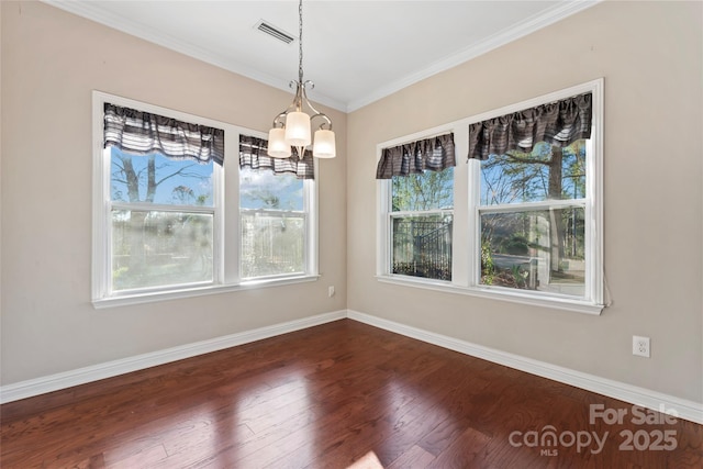 2439 Bergamot St, Fort Mill, SC 29708 - unfurnished dining area featuring wood finished floors, visible vents, baseboards, crown molding, and a notable chandelier