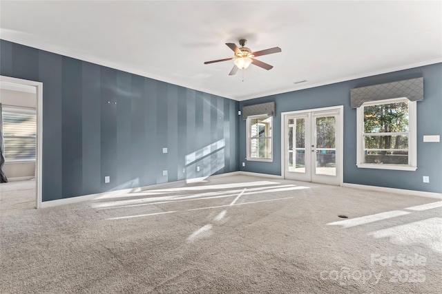 2439 Bergamot St, Fort Mill, SC 29708 - carpeted empty room with a ceiling fan, visible vents, baseboards, ornamental molding, and french doors