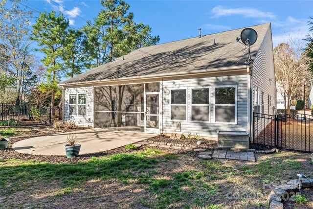 2439 Bergamot St, Fort Mill, SC 29708 - rear view of property with a patio area, a sunroom, and fence