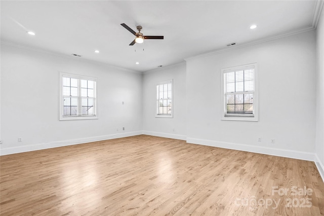 unfurnished room featuring light wood-style floors, recessed lighting, crown molding, and baseboards