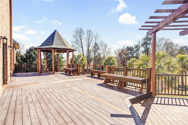 wooden deck featuring a gazebo