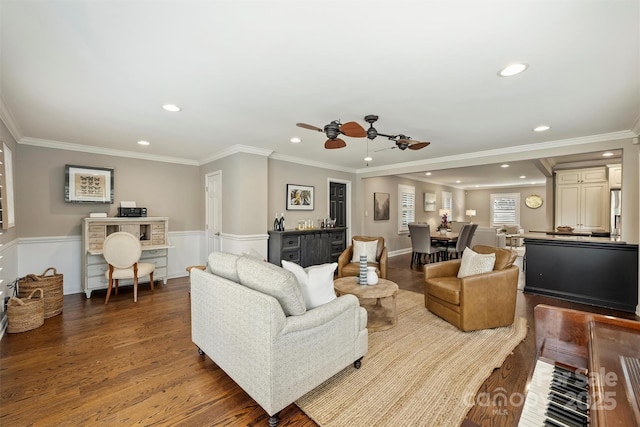 living area featuring recessed lighting, wood finished floors, and crown molding