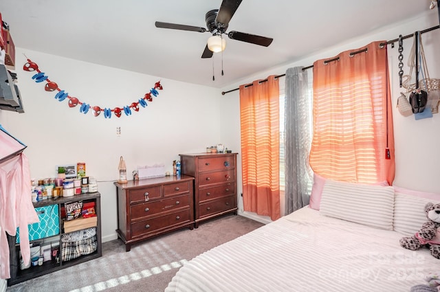 bedroom featuring ceiling fan and light colored carpet