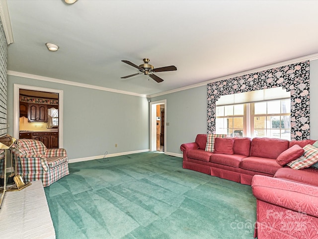 living area with ornamental molding, carpet, a ceiling fan, and baseboards