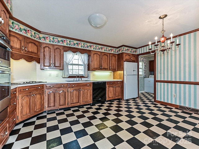 kitchen featuring dark floors, freestanding refrigerator, dishwasher, washer / dryer, and wallpapered walls