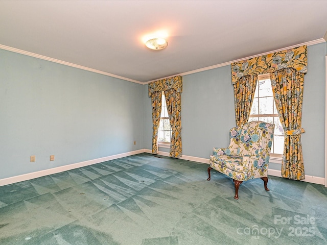 unfurnished room with carpet, baseboards, and crown molding