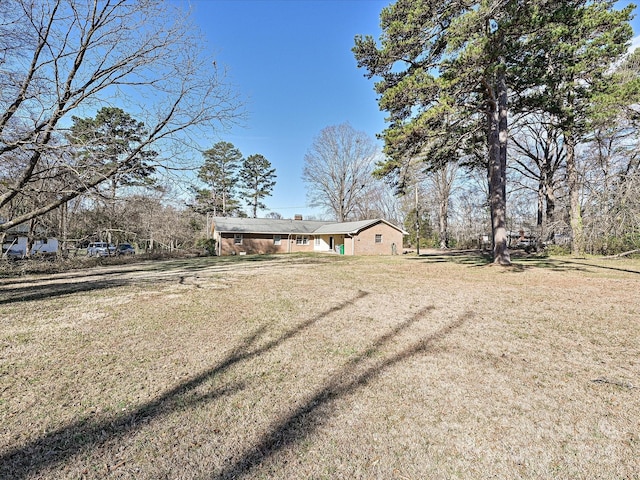 exterior space featuring a front lawn