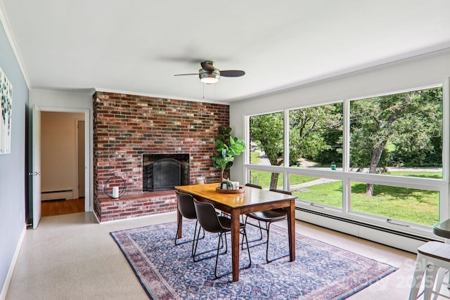 324 Old Leicester Hwy, Asheville, NC 28806 - dining room with a baseboard radiator, a ceiling fan, a brick fireplace, and ornamental molding