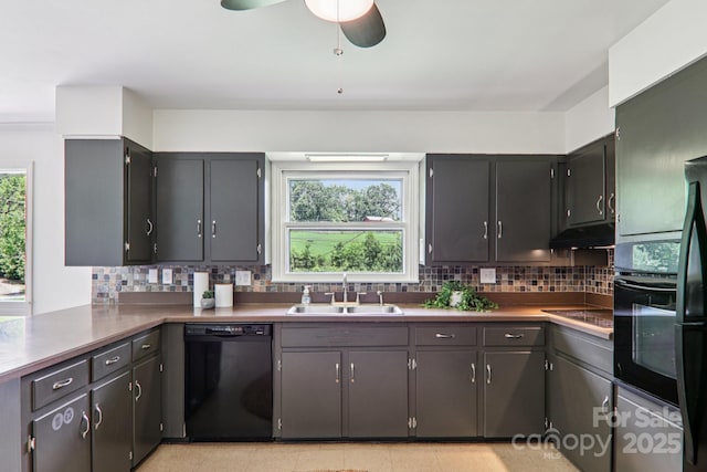 324 Old Leicester Hwy, Asheville, NC 28806 - kitchen featuring black appliances, tasteful backsplash, under cabinet range hood, and a ceiling fan