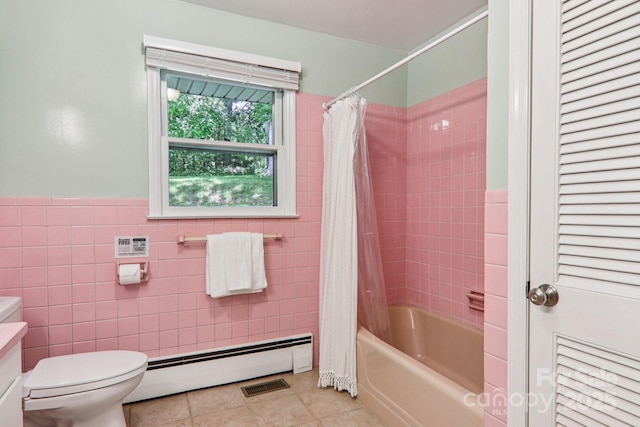 324 Old Leicester Hwy, Asheville, NC 28806 - full bath featuring a baseboard heating unit, tile walls, tile patterned flooring, shower / bath combo, and vanity