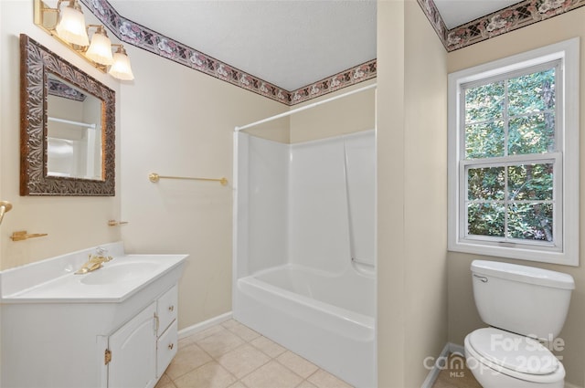 full bath featuring baseboards, bathtub / shower combination, toilet, and vanity