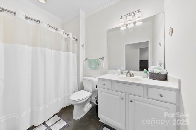 bathroom with toilet, vanity, and crown molding