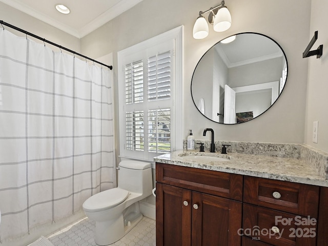 bathroom featuring toilet, tile patterned flooring, vanity, and crown molding