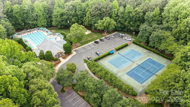 aerial view featuring a view of trees