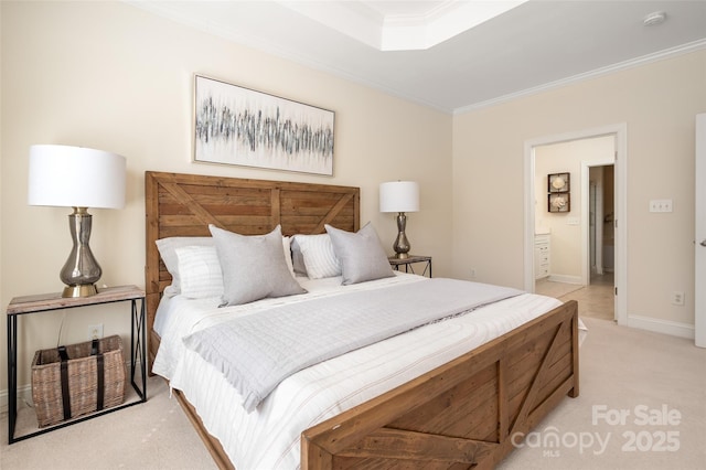 bedroom with baseboards, light carpet, ensuite bath, and crown molding