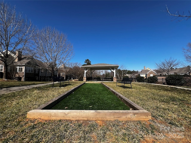 view of home's community featuring a gazebo, a yard, and a residential view