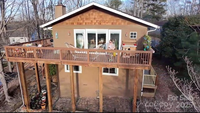 9009 Cebu Ct, Fort Mill, SC 29708 - back of house featuring a chimney and a wooden deck