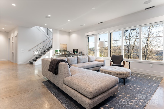 living room featuring stairs, baseboards, visible vents, and recessed lighting