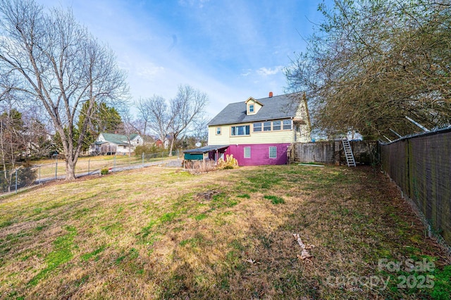 view of yard featuring a fenced backyard