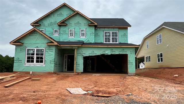 property under construction featuring a garage