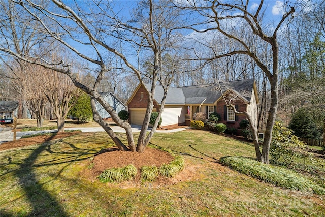 view of front of home with concrete driveway, brick siding, an attached garage, and a front lawn