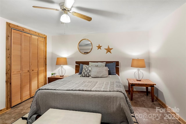 bedroom with a closet, a ceiling fan, and baseboards