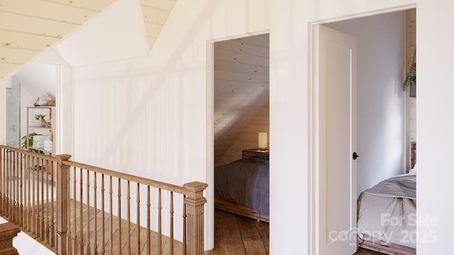 corridor with wood-type flooring