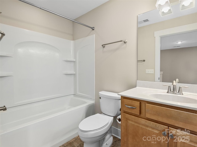 full bathroom with toilet, vanity, and  shower combination