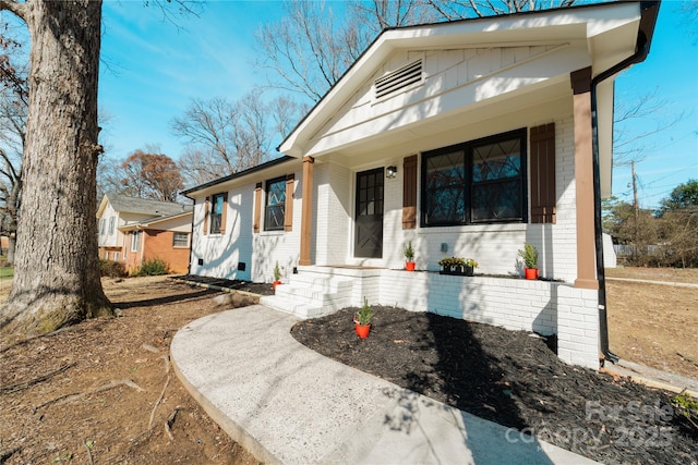 bungalow-style house with covered porch