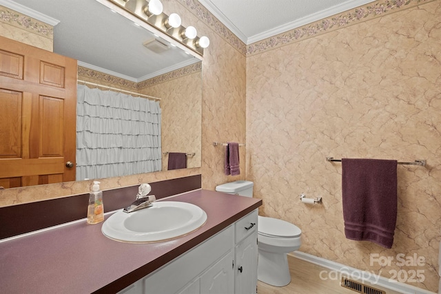 full bathroom featuring visible vents, a shower with shower curtain, toilet, ornamental molding, and vanity