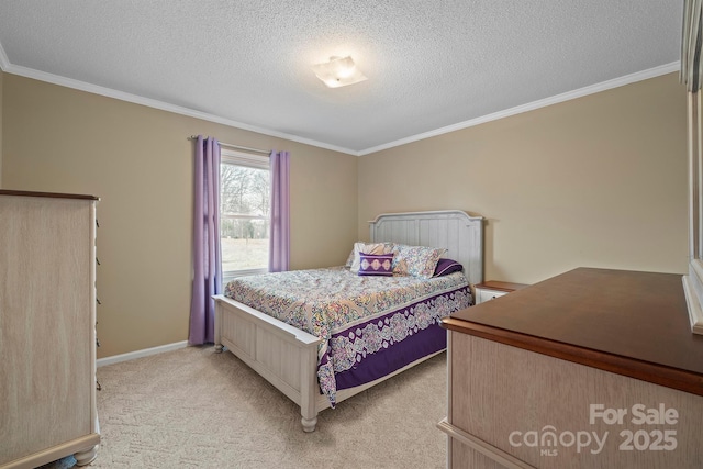 bedroom with ornamental molding, light carpet, a textured ceiling, and baseboards