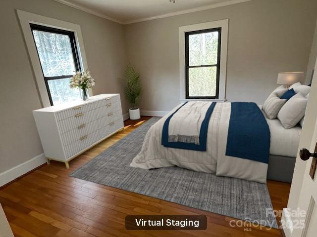 5135 Tucker Ave, Kannapolis, NC 28081 - bedroom featuring radiator, ornamental molding, and wood finished floors