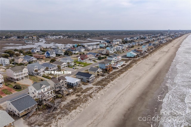 aerial view featuring a beach view and a water view