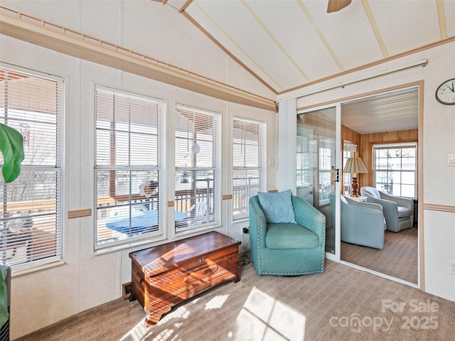 sunroom featuring lofted ceiling