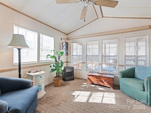 sunroom / solarium featuring ceiling fan and vaulted ceiling