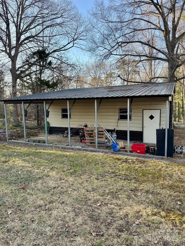 view of outbuilding featuring a carport