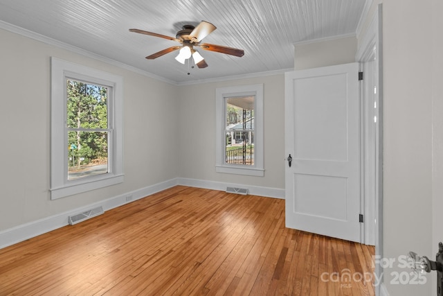 1216 Innis Ave, Kannapolis, NC 28081 - unfurnished bedroom with light wood-type flooring, visible vents, and multiple windows