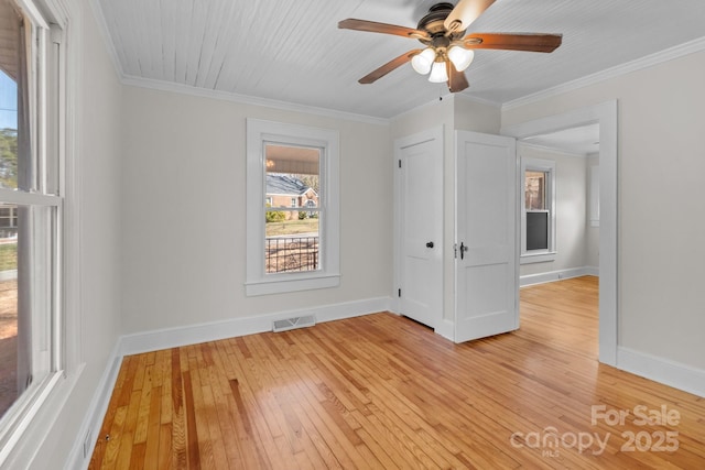 1216 Innis Ave, Kannapolis, NC 28081 - unfurnished bedroom featuring visible vents, light wood-style flooring, baseboards, and ornamental molding