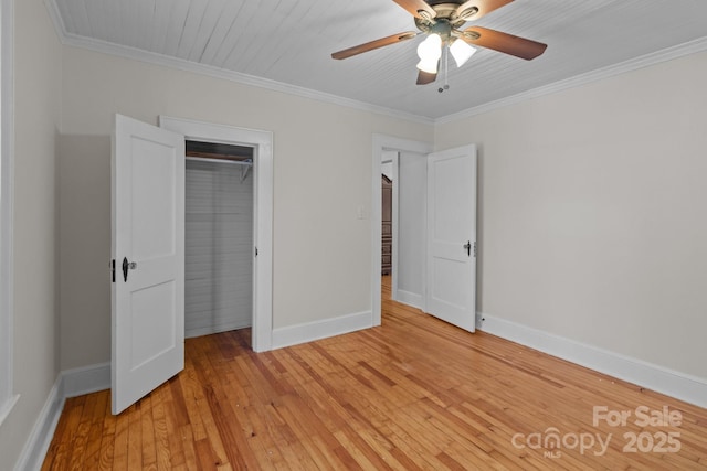 1216 Innis Ave, Kannapolis, NC 28081 - unfurnished bedroom with a closet, baseboards, light wood-style flooring, and ornamental molding