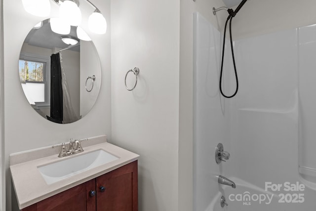 1216 Innis Ave, Kannapolis, NC 28081 - bathroom featuring vanity and shower / bathing tub combination
