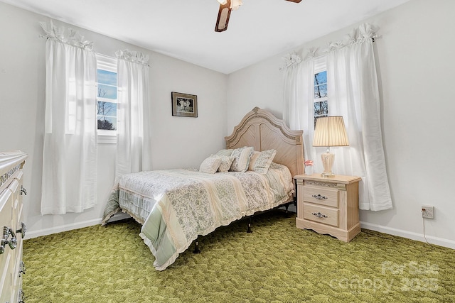 bedroom with ceiling fan and carpet floors