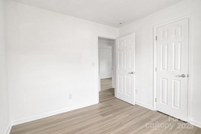 unfurnished bedroom with light hardwood / wood-style flooring