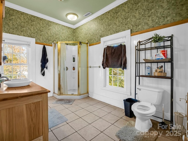 bathroom with a stall shower, visible vents, crown molding, and vanity