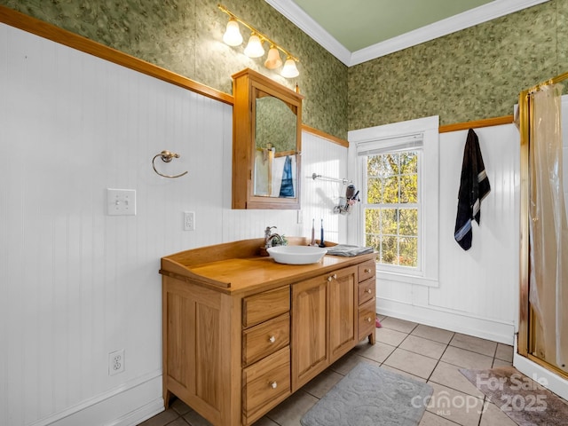 full bathroom with vanity, baseboards, ornamental molding, tile patterned floors, and wallpapered walls