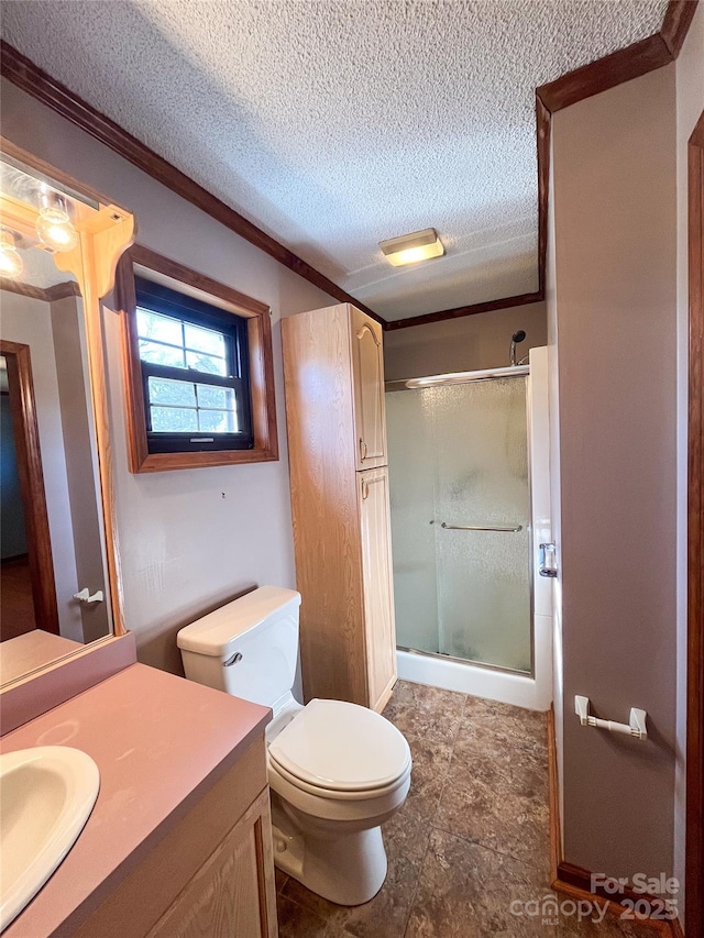 full bath featuring toilet, a shower stall, a textured ceiling, and vanity