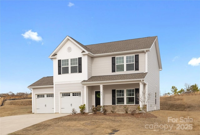 view of front of property with a garage